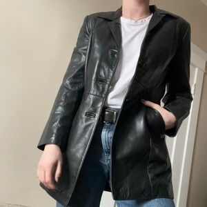 Vintage leather jacket. Double lined. Removable vest inside.